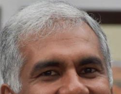 Ahuja Gets 1 More Year